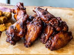 Stiles Switch BBQ & Brew signature dishes Brisket, St. Louis Pork Ribs, Oak Smoked Wings.